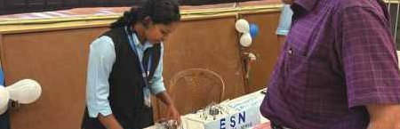 Guest viewing an electronics exhibit