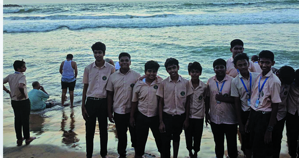 Students on the beach during study tour