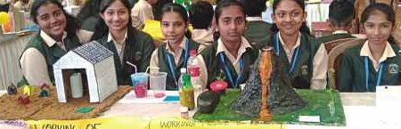 Students demonstrating solar panel model
