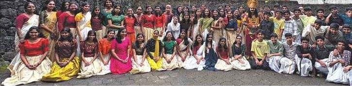 Students and teachers celebrating Onam