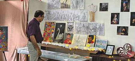 Guest viewing the art section of the exhibition