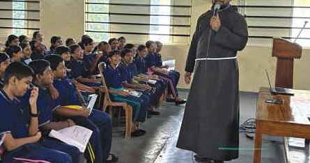Workshop speaker addressing seated students