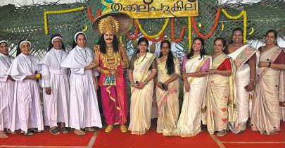 King Maveli with teachers on Onam